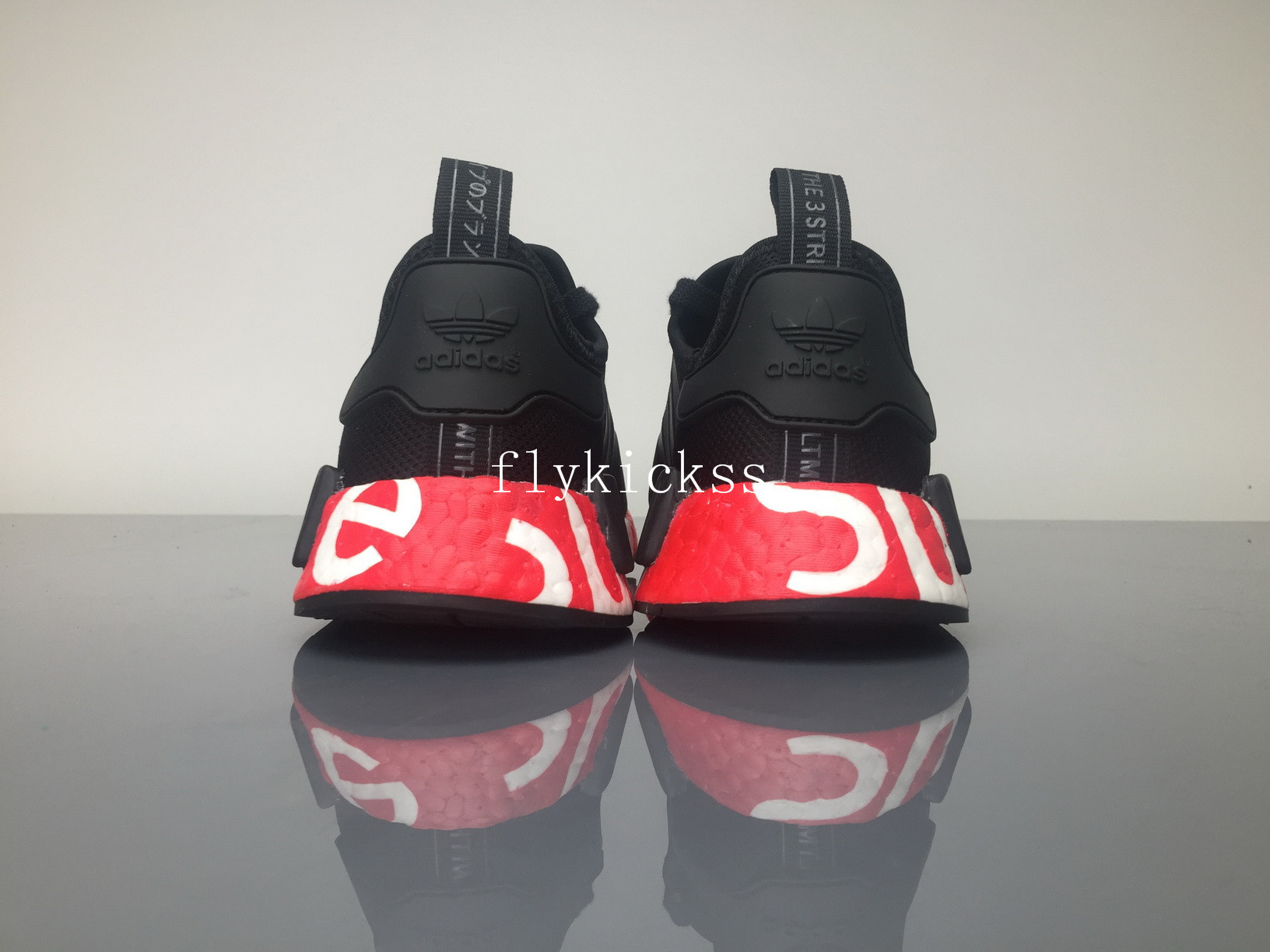 Supreme x Adidas NMD R1 Black Real Boost